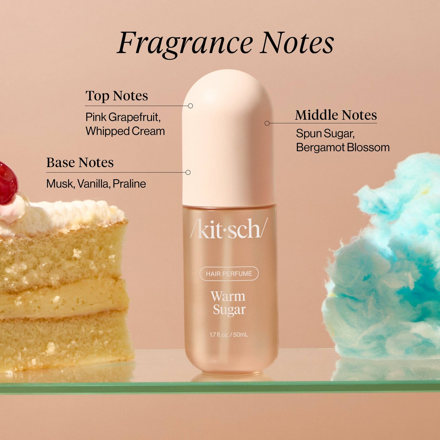 Kitsch hair perfume bottle with fragrance notes text and visual elements on a pink background