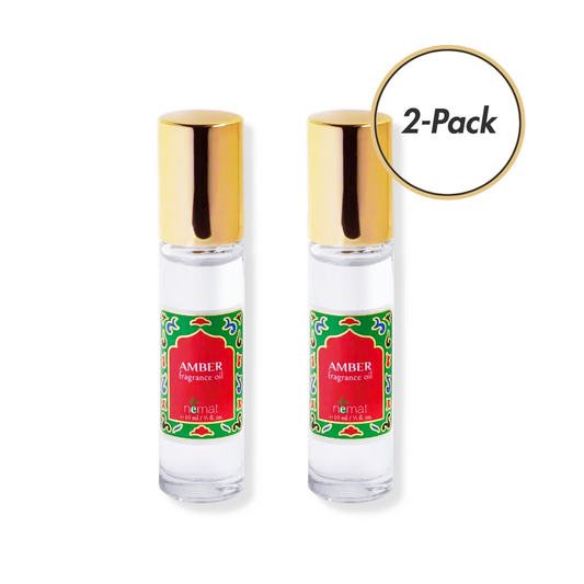 Two bottles of Amber Fragrance Oil with gold caps on a white background. 2-Pack exclusive to WeHitPan Beauty.
